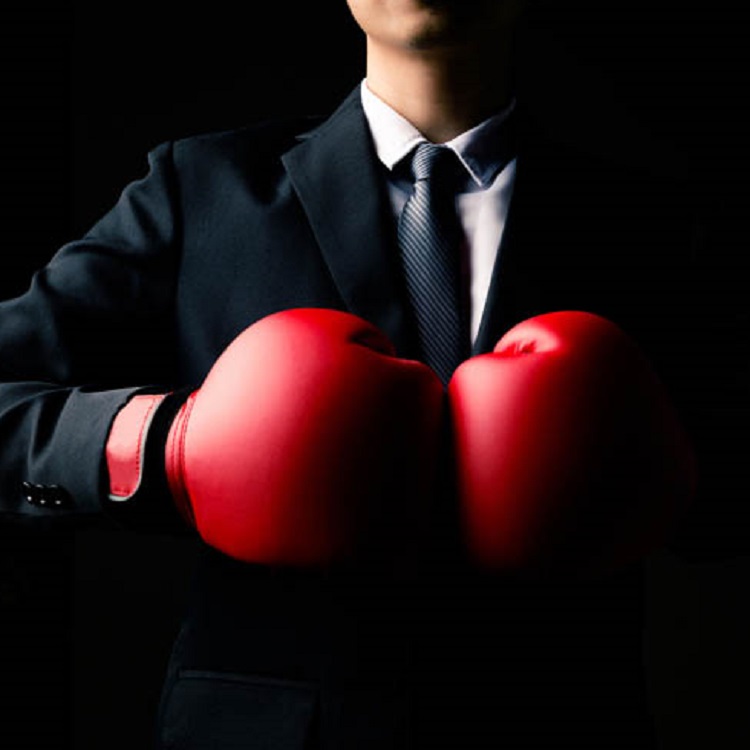 Image of a person wearing boxing gloves